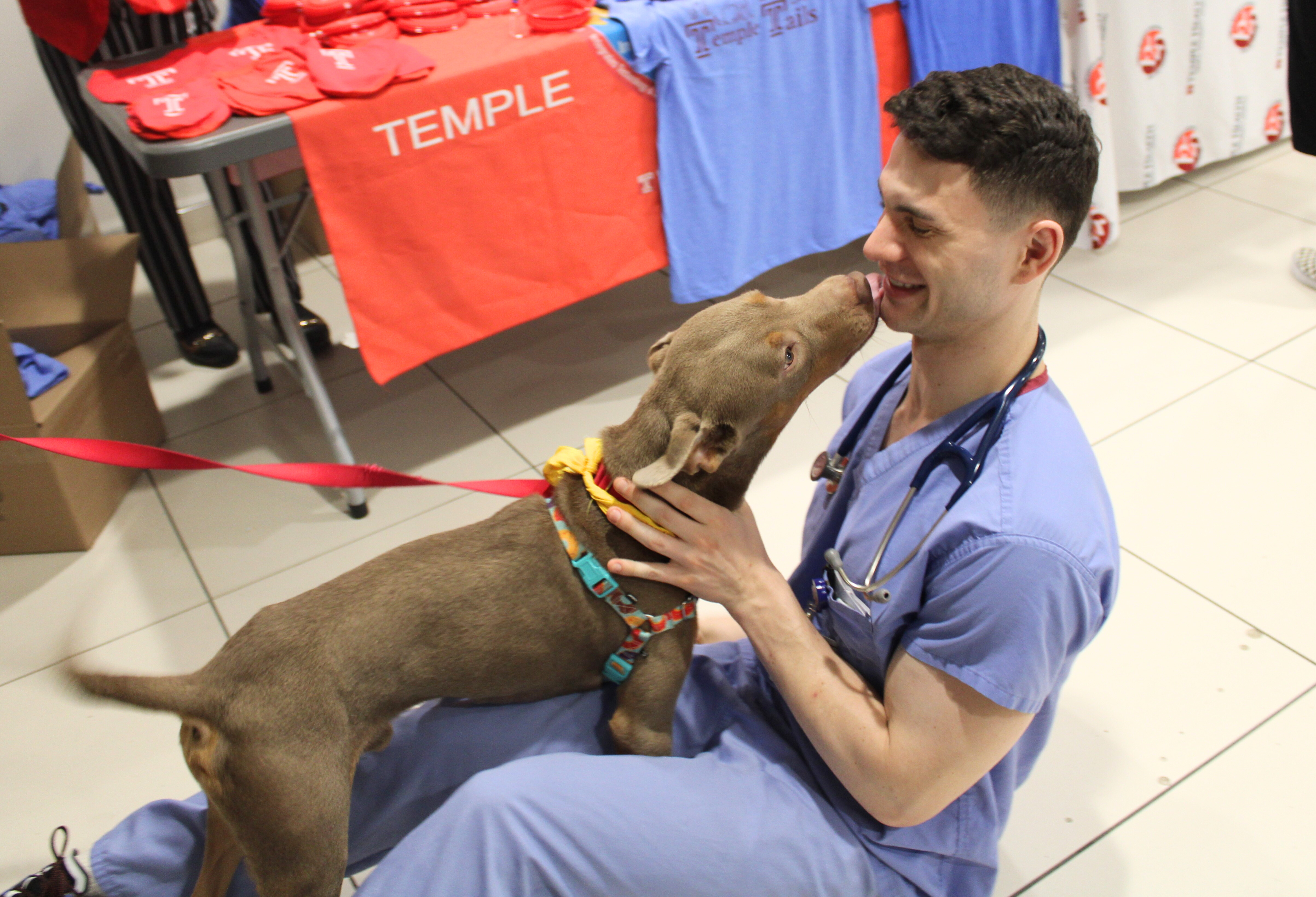  One of our physicians gets a kiss from a new four-legged friend.