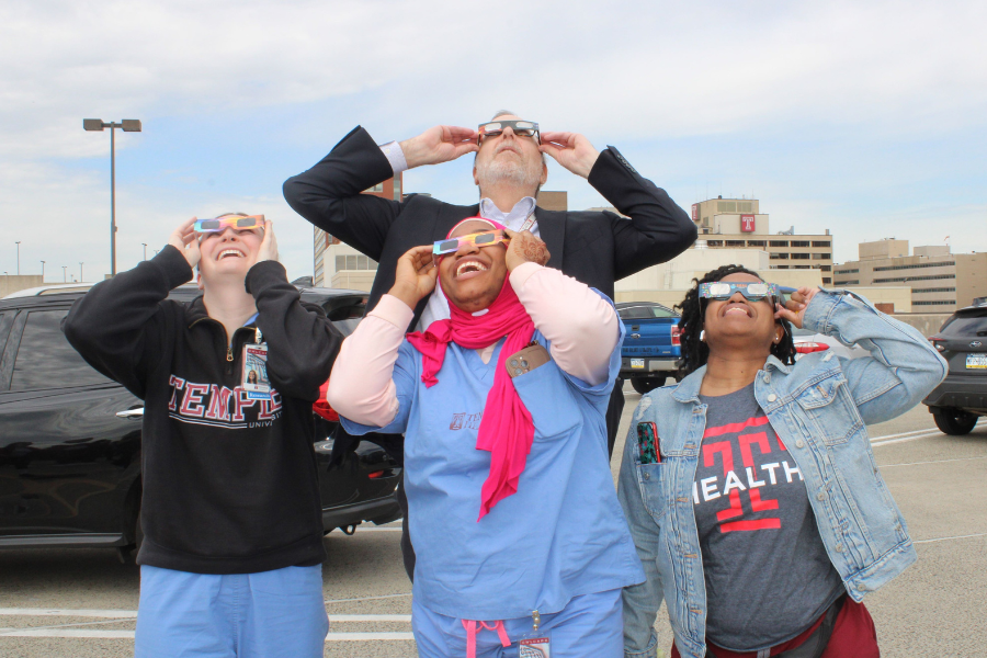 Temple Health staff watching solar eclipse