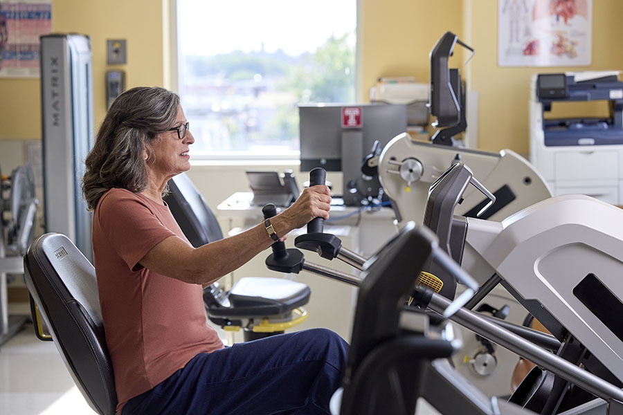 Patient riding bike at Temple pulmonary rehab center