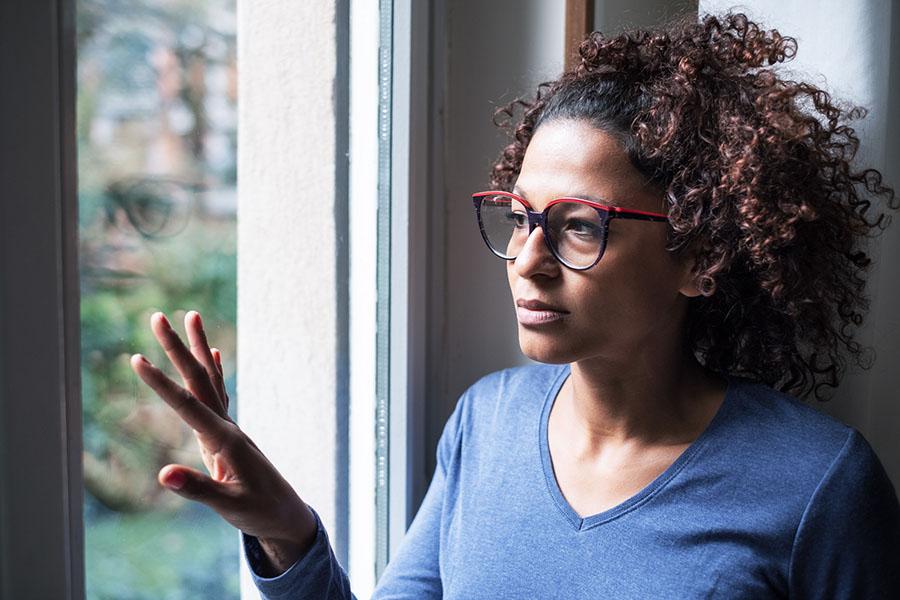 Woman looking out the window
