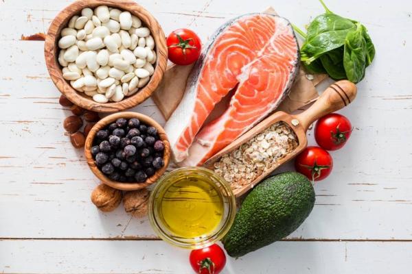 Heart healthy foods placed in the shaped of a heart